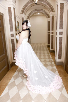 1girl asian black_hair breasts bride chouzuki_maryou cleavage dress highres lipstick makeup photo_(medium) plump solo wedding_dress