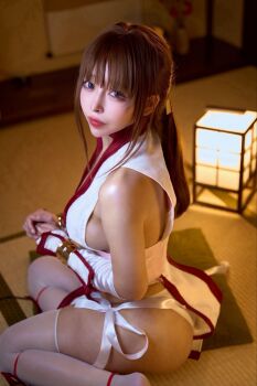 1girl ass breasts brown_hair cosp cosplay cosplay_photo dead_or_alive kagamisou kasumi_(doa) kasumi_(doa)_(cosplay) large_breasts long_hair looking_at_viewer pelvic_curtain photo_(medium) real_life sideboob sitting sleeveless thighhighs