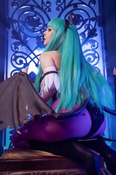 1girl animal_print architecture bat_print bat_print_pantyhose black_boots black_leotard boots capcom cosplay cosplay_photo darkstalkers fake_wings female_focus gothic_architecture green_eyes green_hair head_wings helly_von_valentine_(disharmonica) high_heel_boots high_heels highres indoors leotard long_hair low_wings matching_hair/eyes morrigan_aensland morrigan_aensland_(cosplay) pantyhose photo_(medium) purple_pantyhose real_life solo strapless strapless_leotard window wings