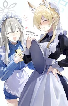 2girls alternate_costume animal_ear_fluff animal_ears apron black_dress blonde_hair blue_archive blue_halo blue_jacket blue_skirt blush cellphone closed_eyes collared_dress commentary_request cowboy_shot dog_ears dog_girl dress enmaided flatshi frilled_apron frills grey_hair grey_halo hair_over_one_eye halo hand_on_own_hip hat heart highres holding holding_phone holding_tray jacket jersey_maid juliet_sleeves kanna_(blue_archive) konoka_(blue_archive) long_hair long_sleeves maid maid_apron maid_headdress mob_cap multiple_girls open_mouth phone puffy_sleeves sharp_teeth simple_background skirt smartphone sweatdrop teeth track_jacket translation_request tray turtleneck turtleneck_jacket unconventional_maid updo white_apron white_background