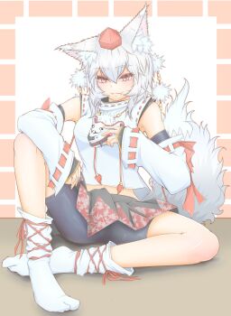 1girl animal_ear_fluff animal_ears bike_shorts black_shorts black_skirt breasts commentary_request cube85 detached_sleeves half_mask hat highres holding holding_mask inubashiri_momiji long_hair looking_at_viewer mask medium_breasts multicolored_skirt pom_pom_(clothes) red_eyes red_hat red_skirt ribbon-trimmed_sleeves ribbon_trim shorts simple_background sitting skirt socks solo tail tokin_hat touhou white_socks wolf_ears wolf_girl wolf_tail