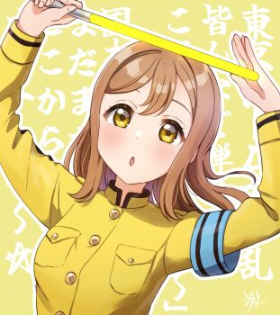 1girl :o armband arms_up blue_armband blush breast_pocket breasts brown_hair coat_dress commentary dress glowstick highres holding holding_glowstick ijigen_fes_idolmaster_love_live!_utagassen kunikida_hanamaru kyaku_tasu long_hair long_sleeves looking_at_viewer love_live! love_live!_nijigasaki_high_school_idol_club love_live!_sunshine!! medium_breasts open_mouth outline penlight_(glowstick) pleated_dress pocket ryouran!_victory_road_(love_live!) sidelocks signature solo text_background translation_request upper_body white_outline yellow_background yellow_dress yellow_eyes