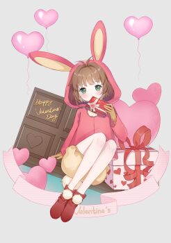 1girl animal_ear_hood animal_ears antenna_hair balloon banner bare_legs boots box box_of_chocolates brown_gloves brown_hair candy cardcaptor_sakura child chocolate chocolate_bar commentary_request covered_mouth cup_(13636466299) dot_nose eyelashes fake_animal_ears fake_tail food frilled_shorts frills full_body gift gloves green_eyes grey_background hair_intakes happy_valentine heart heart_balloon heart_in_eye highres holding holding_box hood hood_up hooded_jacket jacket kinomoto_sakura kinomoto_sakura_(winter_bunny) knees light_blush long_sleeves looking_at_viewer no_socks object_to_mouth oversized_food oversized_object pink_jacket pom_pom_(clothes) puffy_shorts rabbit_ears rabbit_tail red_boots short_hair_with_long_locks shorts sidelocks sitting solo symbol_in_eye tail valentine yellow_shorts