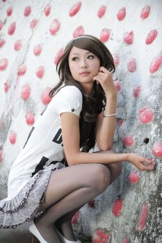 1girl absurdres asian asiangirl5832 brown_hair facing_viewer female_focus headband high_heels highres long_hair model outdoors pantyhose photo_(medium) shirt skirt solo white_shirt