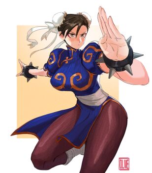 1girl absurdres artist_name bangle black_hair blue_dress blush border bracelet breasts brown_eyes brown_pantyhose bun_cover capcom china_dress chinese_clothes chun-li commentary cowboy_shot double_bun dress eyeliner fighting_stance furrowed_brow gold_trim hair_between_eyes hair_bun highres jewelry large_breasts makeup olivetart pantyhose pelvic_curtain puffy_short_sleeves puffy_sleeves red_eyeliner short_sleeves solo spiked_bracelet spikes street_fighter thighs updo white_border yellow_background