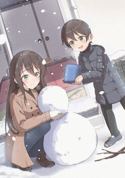1boy 1girl absurdres black_hair breath bucket building_snowman commentary_request gloves green_eyes highres holding holding_bucket jacket kaai_yuu kotatsu long_hair original outdoors short_hair smile snow snowing snowman squatting table winter