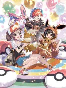 3girls :d aqua_shorts backpack bag brown_eyes brown_hair closed_mouth commentary_request eevee eevee_ears eevee_tail elaine_(pokemon) gen_1_pokemon gen_6_pokemon glasses happy hat headpat highres holding holding_pokemon hood hood_up hoodie long_sleeves multicolored_hair multiple_girls nintendo official_art onesie open_mouth penny_(pokemon) poke_ball_print poke_kid_(pokemon) pokemon pokemon_(creature) pokemon_lgpe pokemon_masters_ex pokemon_sv pokemon_swsh ponytail round_eyewear shirt shoes short_sleeves shorts sitting smile sylveon two-tone_hair zounose