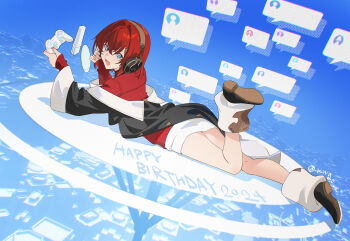 1girl ange_katrina ange_katrina_(1st_costume) black_footwear black_jacket blue_eyes controller foot_up full_body game_controller hair_intakes headphones highres holding holding_controller holding_game_controller jacket kawaguchi_(mojacome) looking_at_viewer lying nijisanji off_shoulder on_stomach open_mouth red_hair red_jacket solo virtual_youtuber wide_sleeves