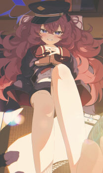 1girl absurdres barefoot blue_archive book crossed_bangs fluffy_hair grey_eyes halo hat highres holding holding_book iroha_(blue_archive) jacket kazueru long_hair looking_at_viewer lying military_hat military_jacket necktie on_back peaked_cap purple_halo red_hair red_necktie short_shorts shorts smile solo tatami