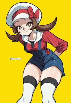 1girl absurdres blue_overalls blush bow breasts brown_eyes brown_hair closed_mouth collarbone hat hat_bow highres komatsuki_n long_hair looking_at_viewer lyra_(pokemon) medium_breasts newsboy_cap nintendo overalls pokemon pokemon_hgss red_shirt shirt smile thighhighs thighs twintails white_hat white_thighhighs yellow_background