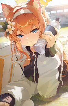 1girl absurdres animal_ear_fluff animal_ears blue_archive blue_eyes bottle cat_ears cat_girl commentary_request double-parted_bangs flower hair_flower hair_intakes hair_ornament hairband halo highres holding holding_bottle long_hair looking_at_viewer lying mari_(blue_archive) mari_(track)_(blue_archive) nudibranchs_(nasae) on_stomach orange_hair outdoors smile solo stadium sunlight sweat track_suit upper_body water_bottle white_flower white_hairband yellow_halo zipper_pull_tab