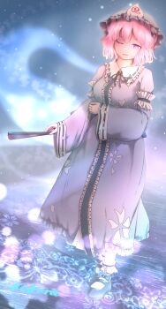 1girl artist_name black_ribbon black_shoes blue_hat blue_kimono blue_ribbon commentary folding_fan frilled_kimono frilled_shirt_collar frills full_body hand_fan hat highres hitodama japanese_clothes kakera_(comona_base) kimono long_sleeves looking_at_viewer mary_janes medium_hair mob_cap neck_ribbon one_eye_closed open_mouth petal_print pink_eyes pink_hair print_kimono ribbon ribbon-trimmed_collar ribbon_trim saigyouji_yuyuko shoes sleeve_garter smile socks solo touhou triangular_headpiece white_socks wide_sleeves