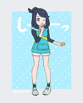 1girl ;) black_hair black_shirt black_socks border closed_mouth finger_to_mouth hair_bun hair_ornament hairclip highres hood hooded_vest hoodie liko_(pokemon) looking_at_viewer low-cut_armhole medium_hair nintendo one_eye_closed outside_border pokemon pokemon_(anime) pokemon_horizons polka_dot polka_dot_background shirt shoes shorts shushing simple_background smile socks sound_effects standing strap swept_bangs twitter_username undershirt vest yibubububu
