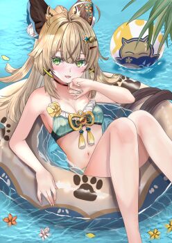 1girl ahoge alternate_costume animal_ear_fluff animal_ears bare_shoulders bikini blush breasts brown_hair cat_ears cleavage commentary_request day fingernails flower genshin_impact green_eyes hair_between_eyes hand_up highres innertube kirara_(genshin_impact) long_hair looking_at_viewer medium_breasts mitsu336 navel on_innertube open_mouth outdoors paw_print solo stomach swim_ring swimsuit very_long_hair water yellow_flower
