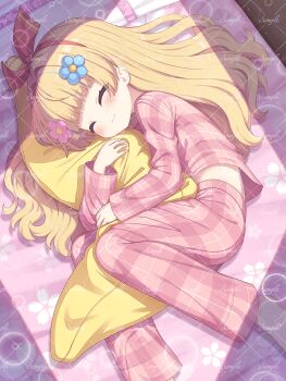 1girl ^_^ barefoot bed blonde_hair blush closed_eyes closed_mouth commentary_request copyright_request facing_viewer feet_out_of_frame frilled_pillow frills highres hugging_object long_hair lying on_bed on_side pajamas pants pillow pink_pajamas pink_pants pink_shirt plaid_clothes plaid_pants plaid_shirt sample_watermark sasakura_momiji shirt solo virtual_youtuber watermark