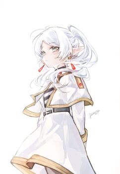 1girl arms_behind_back belt capelet closed_mouth commentary doktahzaki dress earrings elf english_commentary frieren green_eyes highres jewelry long_hair long_sleeves parted_bangs pointy_ears signature simple_background solo sousou_no_frieren teardrop_earrings twintails white_background white_capelet white_dress white_hair