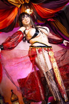 1girl asian belly belly_dancer black_hair breasts chouzuki_maryou cleavage highres large_breasts lipstick makeup photo_(medium) plump solo thick_thighs thighs underboob