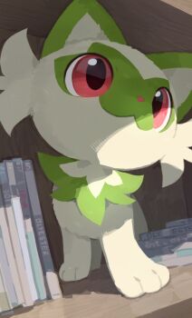 Rule 34 | artist name, cd case, closed mouth, colored sclera, commentary, english commentary, green fur, nintendo, no humans, olyester, photo-referenced, pokemon, pokemon (creature), pokemon focus, red sclera, shelf, solo, sprigatito