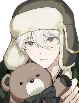1boy :/ ballro black_bow black_hat black_shirt blue_lock bow closed_mouth commentary english_commentary grey_eyes hair_between_eyes hat highres holding male_focus nagi_seishirou shirt simple_background solo stuffed_animal stuffed_toy teddy_bear upper_body ushanka white_background white_hair