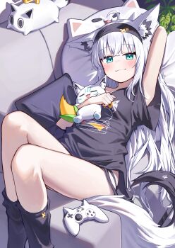 1girl absurdres ahoge animal_ear_fluff animal_ears aqua_eyes arm_up armpits black_hairband black_shirt blush breasts closed_mouth collarbone controller couch deaver fox_ears fox_girl fox_tail game_controller hair_between_eyes hairband highres hololive hug long_hair looking_at_viewer lying medium_breasts on_back on_couch shirakami_fubuki shirt smile sukonbu_(shirakami_fubuki) tail very_long_hair virtual_youtuber white_hair