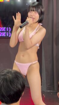 1boy 1girl animated bikini breasts dancing idol japanese_(nationality) microphone pink_bikini real_life singing swimsuit tagme video