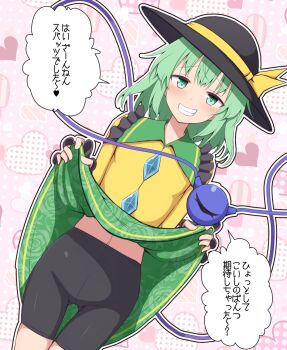 1girl bike_shorts black_hat black_shorts blush bow clothes_lift commentary_request contrast_collar cowboy_shot dutch_angle floral_print floral_print_skirt frilled_shirt_collar frilled_sleeves frills gluteal_fold green_eyes green_hair green_skirt hat hat_bow hat_ribbon heart heart_background highres komeiji_koishi lifting_own_clothes long_sleeves looking_at_viewer medium_hair navel open_mouth outline patterned_background pink_background polka_dot polka_dot_background print_skirt ribbon shirt shorts sidelocks skindentation skirt skirt_lift smile solo speech_bubble standing stomach teeth teoi_(good_chaos) thighs third_eye touhou translation_request white_outline yellow_bow yellow_ribbon yellow_shirt