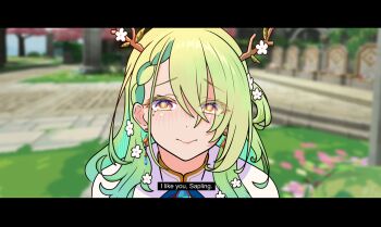 1girl absurdres antlers blurry blush ceres_fauna ceres_fauna_(1st_costume) commentary english_commentary ginotty green_hair highres hololive hololive_english horns letterboxed long_hair mole mole_under_eye smile solo subtitled upper_body virtual_youtuber