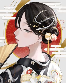 1girl absurdres aoiame back_bow black_hair black_kimono bow chinese_zodiac egasumi floral_print floral_print_kimono folding_fan from_behind grey_eyes hair_bun hair_ornament hand_fan highres holding holding_fan japanese_clothes kanzashi kimono lone_nape_hair looking_down mole mole_on_neck mole_under_eye nape new_year original parted_lips print_kimono profile short_hair single_side_bun snake_hair_ornament snake_print solo tassel upper_body white_bow year_of_the_snake