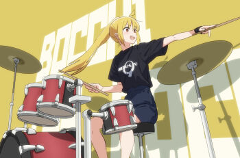 1girl ahoge alternate_hairstyle black_shirt blonde_hair blue_skirt bocchi_the_rock! commentary_request copyright_name cymbals drum drum_set drumsticks feet_out_of_frame highres holding holding_drumsticks ijichi_nijika instrument long_hair miniskirt on_stool open_mouth outstretched_arm pencil_skirt pointing ponytail print_shirt red_eyes shadow shirt shirt_tucked_in short_sleeves sitting skirt smile t-shirt text_background washu_junkyu wispy_bangs wristband yellow_background