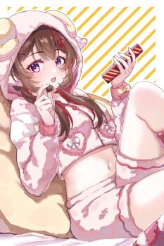 1girl animal_hood brown_hair chocolate commentary_request commission cropped_hoodie duckmo fake_horns food hair_ornament heart heart_hair_ornament highres holding holding_chocolate holding_food hood hood_up hoodie horns indie_virtual_youtuber long_hair long_sleeves midriff nagisa_(vtuber) navel open_mouth pink_hood pink_hoodie pink_shorts purple_eyes second-party_source sheep_hood sheep_horns shorts sitting sleepwear solo virtual_youtuber