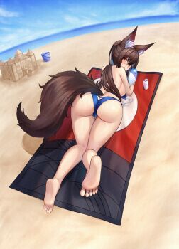 1girl absurdres animal_ears ass ass_cutout ball beach beachball bikini blue_bikini blue_sky blush breasts bucket butt_crack closed_mouth clothing_cutout cloud commentary feet full_body highres horizon imaizumi_kagerou large_breasts long_hair looking_at_viewer looking_back lying mikotouca ocean on_stomach outdoors red_eyes sand_castle sand_sculpture sky soles solo swimsuit tail topless_female touhou towel undone_bikini variant_set wolf_ears wolf_girl wolf_tail