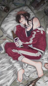 1boy barefoot biting_own_lip black_tank_top blanket blush bonnouji_momoha book bottle brown_hair collarbone crumpled_paper curled_up dirty dr.k_(doctorkodok) fang full_body genderswap genderswap_(ftm) hair_between_eyes hand_on_own_chin head_on_pillow highres holding holding_bottle jacket kimi_no_koto_ga_dai_dai_dai_dai_daisuki_na_100-nin_no_kanojo leg_hair lid looking_at_viewer male_focus medium_hair messy_hair off-shoulder_jacket off_shoulder orange_eyes pants paper pectoral_cleavage pectorals pen pillow red_jacket red_pants sleeves_past_fingers sleeves_past_wrists solo tank_top tissue_box track_jacket track_pants track_suit trash used_tissue water_bottle wine_bottle wolf_cut zipper zipper_pull_tab