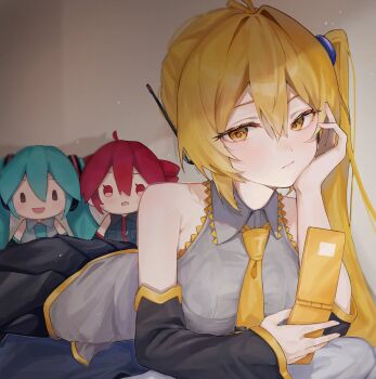 1girl :/ akita_neru antenna_hair bare_shoulders blonde_hair commentary_request detached_sleeves hair_between_eyes hatsune_miku headset highres holding holding_phone kasane_teto light_blush long_hair looking_at_viewer lying necktie on_bed on_stomach phone ponpoko_rin0826 side_ponytail solo stuffed_toy very_long_hair vocaloid yellow_eyes yellow_necktie