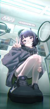 1girl absurdres black_shoes blue_eyes ceiling_light closed_mouth clothes_dryer floomf grey_jacket hand_up highres hololive hololive_english indoors jacket laundromat ninomae_ina'nis ninomae_ina'nis_(loungewear) official_alternate_costume official_alternate_hairstyle pointy_ears purple_hair shoes short_hair smile solo squatting v virtual_youtuber