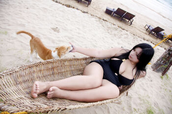 1girl asian black_hair breasts chouzuki_maryou dog large_breasts photo_(medium) plump solo swimsuit