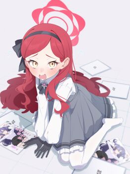 1girl absurdres black_gloves black_hairband black_ribbon blue_archive blush commentary dress frilled_dress frills gloves grey_dress hairband halo highres long_hair long_sleeves looking_at_viewer manga_(object) no_shoes on_floor open_mouth pantyhose red_hair ribbon shirt sitting solo sweat takane_(blue_archive) take_mawile white_pantyhose white_shirt yuuka_(blue_archive)