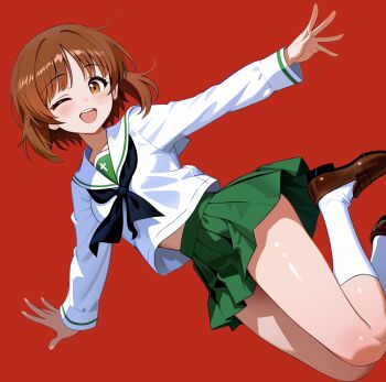1girl blush brown_eyes brown_hair brown_shoes girls_und_panzer green_skirt happy highres looking_at_viewer nishizumi_miho one_eye_closed ooarai_school_uniform open_mouth red_background sailor_collar school_uniform shirt shoes simple_background skirt smile socks solo teeth upper_teeth_only white_shirt white_socks zaofeng