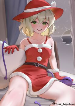 1girl absurdres alternate_costume alternate_headwear bed belt black_belt blush broken_glass collarbone commentary_request dress eyeball fur-trimmed_dress fur-trimmed_gloves fur_trim glass gloves green_eyes green_hair hat highres indoors komeiji_koishi looking_at_viewer medium_hair on_bed open_mouth pillow pom_pom_(clothes) red_dress red_gloves red_hat santa_costume santa_dress smile solo soo_kazahana teeth third_eye touhou twitter_username upper_teeth_only