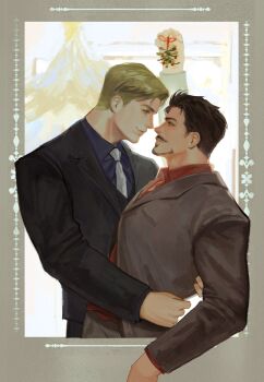 2boys arm_up avengers_(series) black_hair black_jacket blonde_hair blue_eyes blue_shirt border brown_eyes brown_jacket brown_pants christmas christmas_ornaments christmas_tree closed_mouth collared_shirt commentary english_commentary facial_hair formal_clothes grey_border hand_around_wrist highres holding hug jacket kdf_(nomorelemontea) lapels lips long_sleeves looking_at_another male_focus marvel mistletoe multiple_boys necktie new_year orange_necktie outside_border pants red_ribbon red_shirt ribbon shirt short_hair simple_background smile star_ornament steve_rogers suit suit_jacket teeth tony_stark upper_body white_background white_necktie yaoi