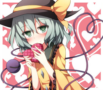 Rule 34 | 1girl, black hat, blush, border, bow, box, buttons, closed mouth, commentary request, creta (taku10), diamond button, frilled shirt collar, frilled sleeves, frills, gift, green eyes, green hair, hair between eyes, hands up, hat, hat bow, hat ribbon, heart, heart-shaped box, heart-shaped pupils, heart background, heart of string, holding, holding gift, komeiji koishi, long sleeves, looking at viewer, medium hair, outside border, pink background, ribbon, shirt, smile, solo, symbol-shaped pupils, third eye, touhou, upper body, valentine, white border, wide sleeves, yellow bow, yellow ribbon, yellow shirt