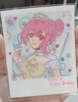 Rule 34 | 1girl, absurdres, armor, artist's hand in frame, blue background, blue gemstone, breastplate, brooch, brown eyes, character name, chest jewel, closed mouth, collar, collarbone, detached collar, dot nose, dress, english text, eyelashes, gem, hair between eyes, hair bun, hand up, happy, happy birthday, heart, heart brooch, highres, infinity nikki, jewelry, lace collar, lips, looking at viewer, melody bloom (infinity nikki), nikki (nikki), nikki (series), object floating above hand, off-shoulder dress, off shoulder, origami, painting (medium), paper crane, photo (medium), pink hair, pink lips, polka dot, polka dot background, short hair with long locks, short sleeves, single side bun, single sidelock, smile, solo, star (symbol), sue78218, sword, sword on back, tiara, traditional media, updo, upper body, weapon, weapon on back, white collar, white dress