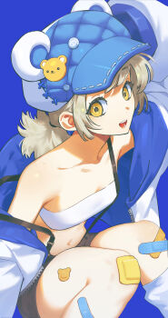 1girl :d absurdres bandaid bandaid_on_knee bandaid_on_leg bare_shoulders bear_hat bear_hat_ornament blue_background breasts cleavage highres jacket looking_at_viewer medium_hair midriff navel off_shoulder open_mouth original ponytail short_ponytail small_breasts smile solo suspenders suspenders_slip tanjwi unzipped white_jacket yellow_eyes