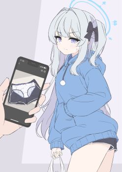 1girl 1other bag black_ribbon black_shorts blue_archive blue_eyes blue_halo blue_hoodie bow bow_panties closed_mouth dolphin_shorts drawstring embarrassed from_side grey_background hair_intakes hair_ribbon halo hand_in_pocket highres holding holding_bag holding_phone hood hood_down hoodie light_blush long_hair looking_at_another miyako_(blue_archive) miyako_(young)_(blue_archive) mizusaki_(kn27) one_side_up panties phone photo_(object) polka_dot polka_dot_panties pom_pom_(clothes) ribbon short_shorts shorts side_ponytail sidelocks simple_background small_sweatdrop solo_focus two-tone_background underwear unworn_panties unworn_shorts white_background white_hair white_panties