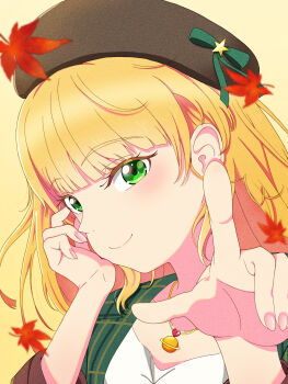 1girl absurdres blonde_hair blunt_bangs brown_hat brown_jacket casual cheek_rest closed_mouth commentary_request green_eyes green_ribbon hand_on_own_cheek hand_on_own_face hat hat_ribbon heanna_sumire highres jacket leaf litecolors_radi long_hair long_sleeves looking_at_viewer love_live! love_live!_superstar!! maple_leaf planet_necklace pointing pointing_at_viewer ribbon smile solo upper_body yellow_background