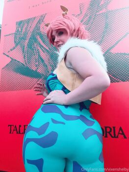 1girl absurdres artist_name ashido_mina ashido_mina_(cosplay) ass boku_no_hero_academia colored_skin cosplay cosplay_photo female_focus hand_on_own_hip highres horns huge_ass looking_to_the_side onlyfans photo_(medium) pink_hair pink_skin real_life smile solo vixenshelby watermark web_address yellow_horns