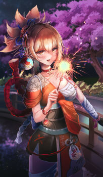 1girl absurdres arm_tattoo bandaged_arm bandages blonde_hair bracelet breasts chehg chest_sarashi commentary_request cowboy_shot fireworks genshin_impact hair_ornament highres holding holding_fireworks japanese_clothes jewelry medium_breasts night open_mouth orange_eyes pyro_symbol_(genshin_impact) sarashi smile solo sparkler tattoo vision_(genshin_impact) yoimiya_(genshin_impact)