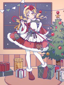 1girl absurdres blonde_hair boots box cane christmas_tree commentary_request dress drill_hair flower full_body gift gift_box hair_flower hair_ornament highres holding holding_cane indoors long_hair looking_at_viewer mahou_shoujo_madoka_magica night red_boots red_dress ruru_(rurumagi) smile snowing solo standing thighhighs tomoe_mami tomoe_mami_(magical_girl) white_thighhighs window yellow_eyes