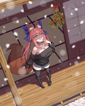 1girl animal_ear_fluff animal_ears bare_shoulders black_sweater black_thighhighs blue_bow blue_shorts bow breasts cleavage commentary fate/grand_order fate_(series) fox_ears fox_girl fox_tail hair_between_eyes hair_bow highres kapi-san large_breasts licking_lips long_hair long_sleeves mistletoe off_shoulder pink_hair short_shorts shorts sidelocks smile snow sweater tail tamamo_no_mae_(fate) thighhighs tongue tongue_out twintails yellow_eyes