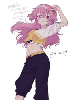 1girl arm_up black_pants breasts crop_top dot_nose feet_out_of_frame floating_hair hair_between_eyes hair_ribbon harusawa highres legs_apart long_hair looking_at_viewer midriff momoi_airi navel pants parted_lips pink_eyes pink_hair project_sekai ribbon shirt short_sleeves simple_background solo standing stomach twitter_username two_side_up white_background yellow_ribbon