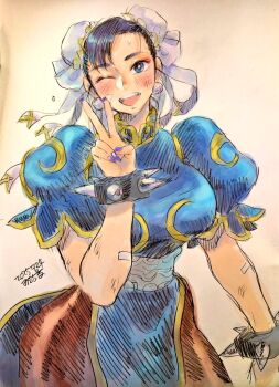 1girl black_hair black_pantyhose blue_dress blue_eyes blue_nails bracelet capcom china_dress chinese_clothes chun-li commentary dated double_bun dress hair_bun hair_ribbon jewelry looking_at_viewer misodiru nail_polish one_eye_closed open_mouth pantyhose puffy_short_sleeves puffy_sleeves ribbon sash short_sleeves signature smile solo spiked_bracelet spikes street_fighter teeth upper_teeth_only v white_sash